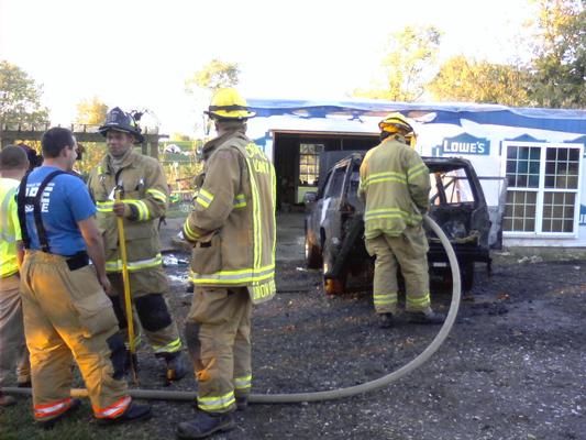 Vehicle Fire next to a garage. Box 8-5. No extension into garage.