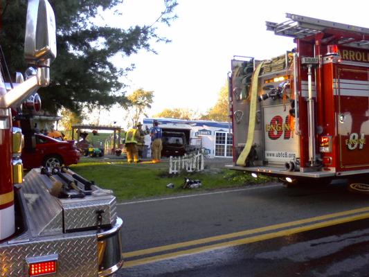 Vehicle Fire next to a garage. Box 8-5. No extension into garage.