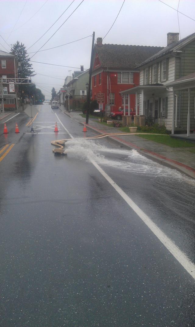 Main St., Union Bridge. As flood waters recede, the pumpouts begin.