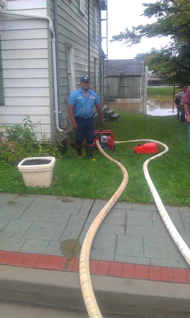 Driver/Pump Operator Archie Jones works hard at helping his neighbors, even when he and his brother, Perry's own business were flooded as well.